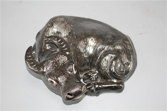 A Chinese black enamelled biscuit porcelain figure of a recumbent ox, probably early 20th century, 25cm
